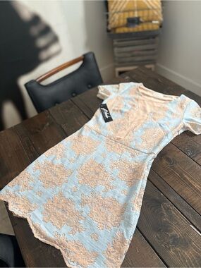 Storia Lace Overlay Dress with Floral Appliqué peach and baby blue